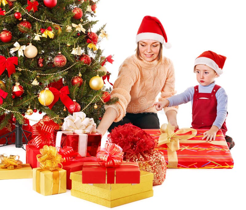 Family with child near Christmas tree. stock image