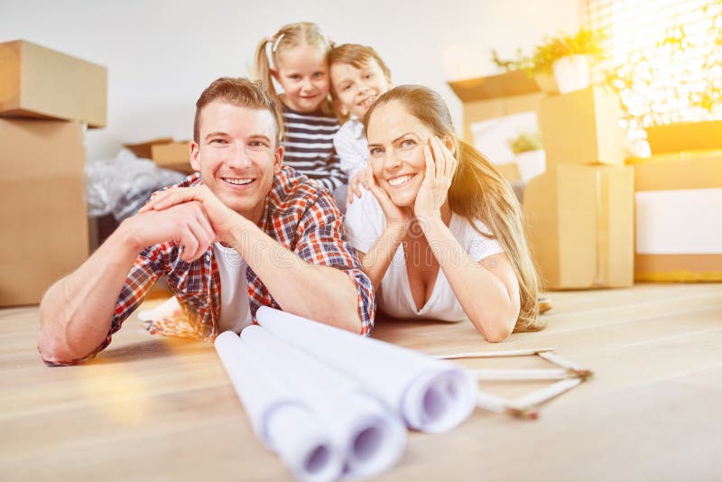Family with children after house construction and move royalty free stock image