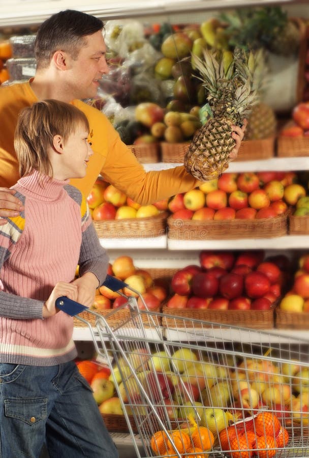 Family Chooses Products in the Store Stock Photo Image of active