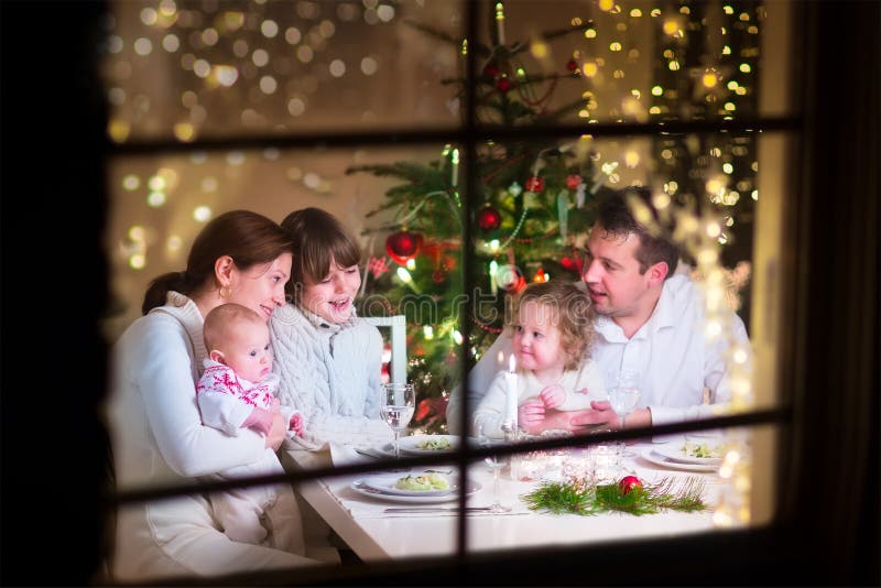 Family at Christmas dinner royalty free stock photography Family at Christmas dinner royalty free stock photography