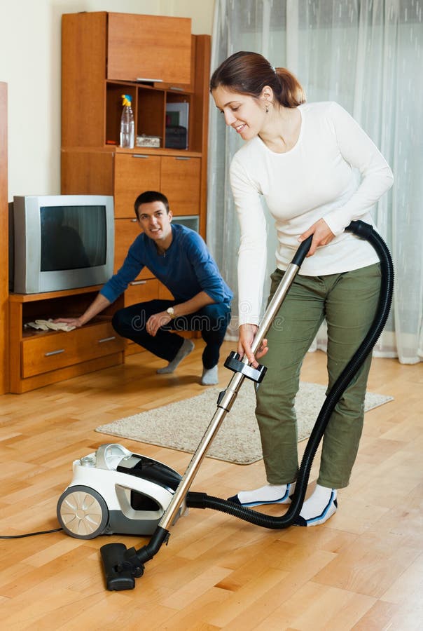 Family Cleaning Home with Vacuum Cleaner Stock Photo Image of people
