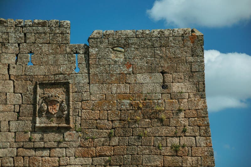 Family coat of arms carved on a wall made of stone stock photo Family coat of arms carved on a wall made of stone stock photo