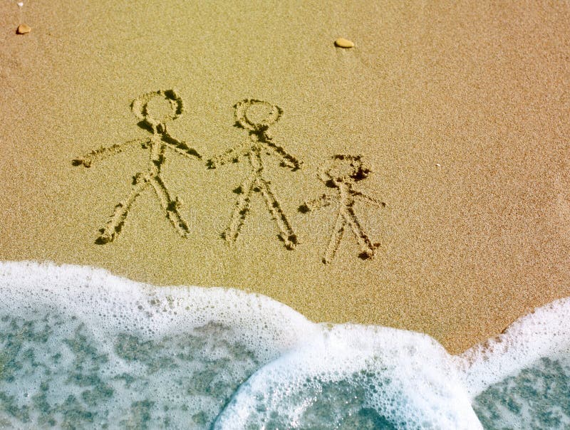 Sand background with family drawing