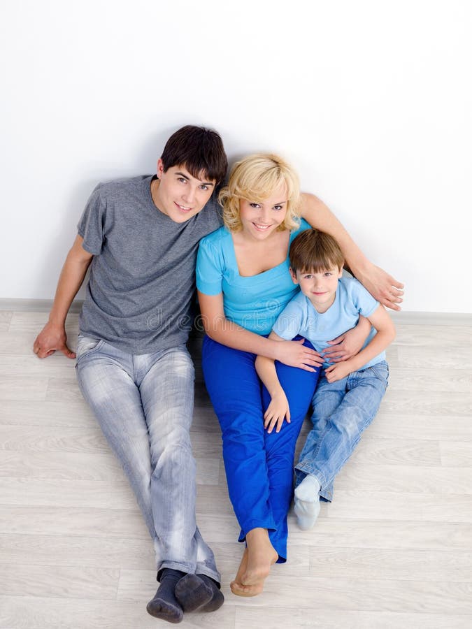 Family in the empty room - high angle royalty free stock images
