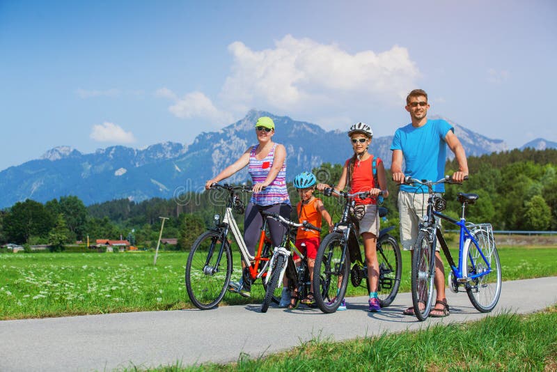 Family Of Four Cycling royalty free stock image Family Of Four Cycling royalty free stock image