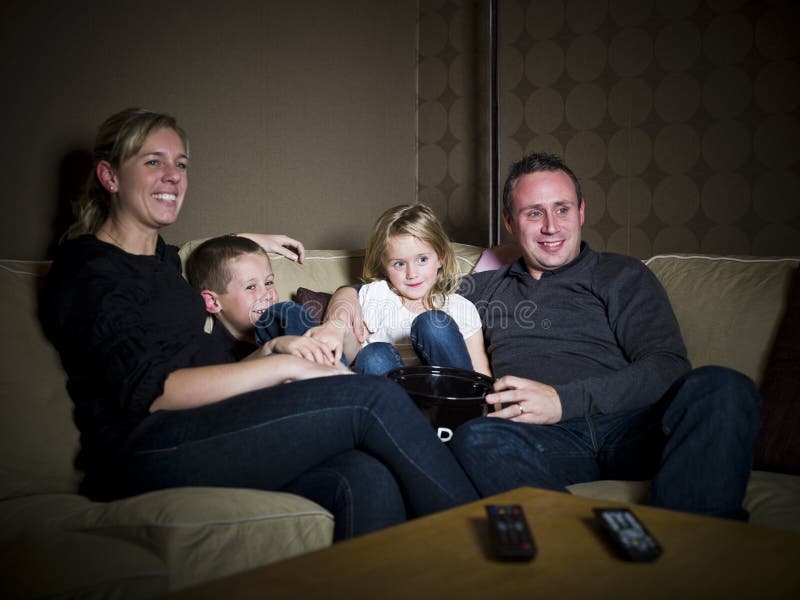 Family in front of the TV