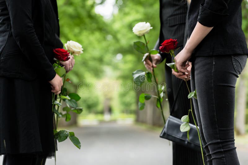 Family in guard of honor at funeral