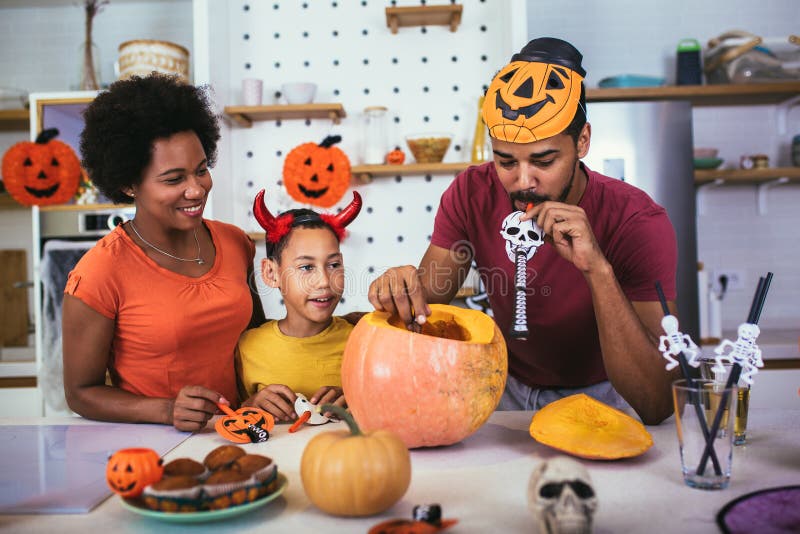 Family has fun in Halloween time royalty free stock photos
