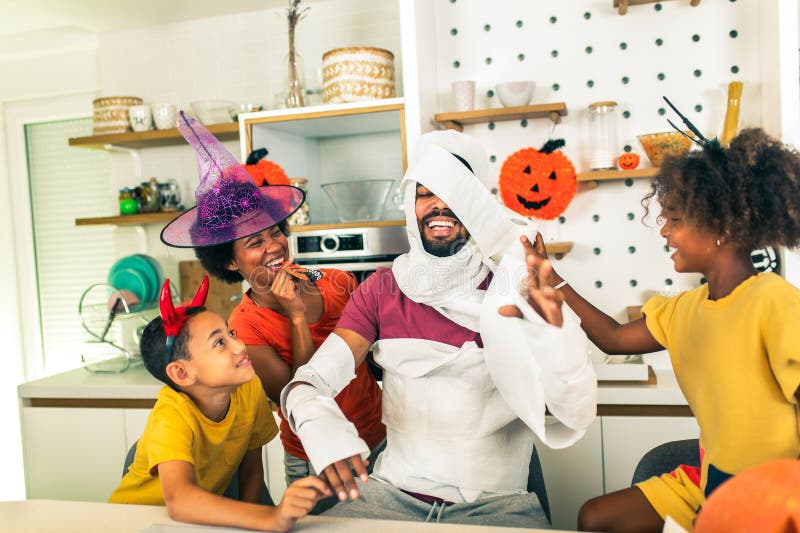 Family has fun in Halloween time stock image