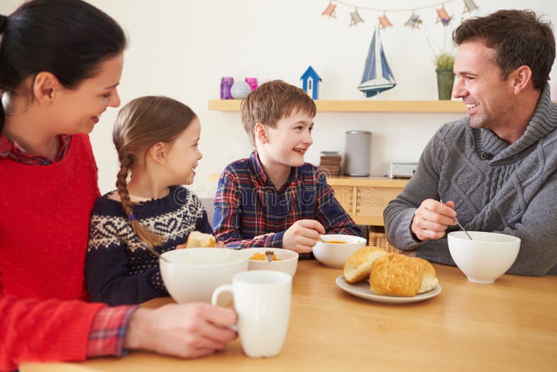 Family Having a Bowl of Soup for Lunch Stock Photo - Image of home ...