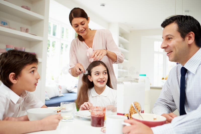 Family Having Breakfast Before Work royalty free stock photo Family Having Breakfast Before Work royalty free stock photo
