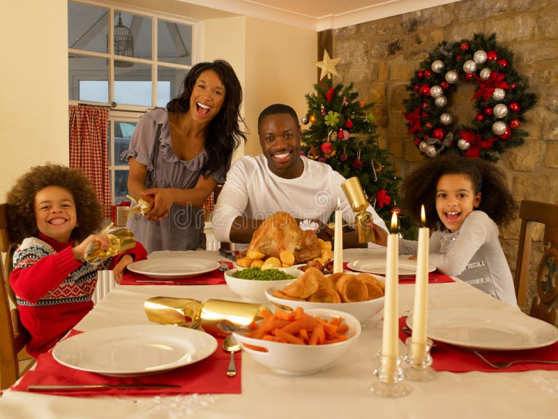 Family Having Christmas Dinner Stock Photo - Image of ...