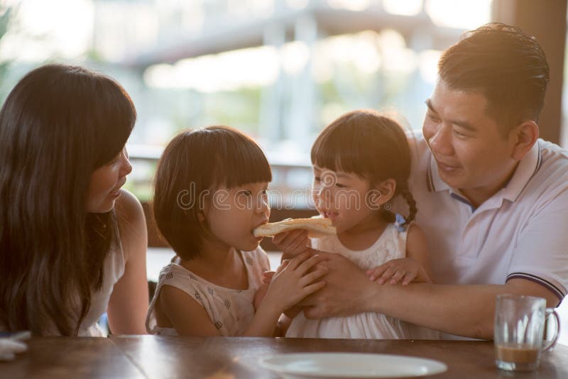 Family having food at cafe