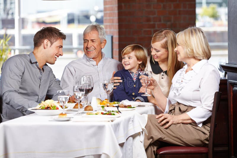 Family having lunch in the restaurant royalty free stock image Family having lunch in the restaurant royalty free stock image