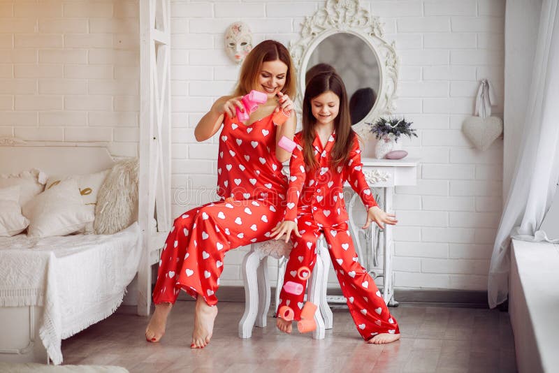 Cute Mother and Daughter at Home in a Pajamas Stock Photo - Image of ...