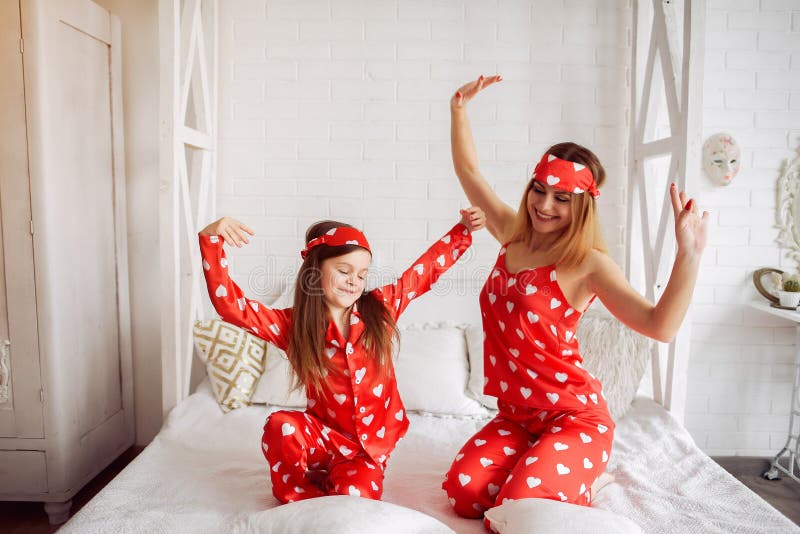 Cute Mother and Daughter at Home in a Pajamas Stock Image - Image of ...