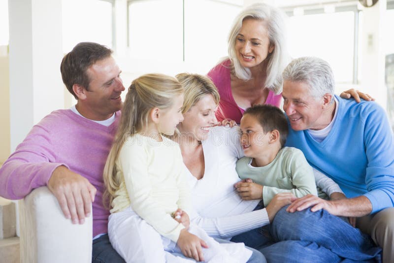 family indoors sitting smiling στοκ εικόνες family indoors sitting smiling στοκ εικόνες