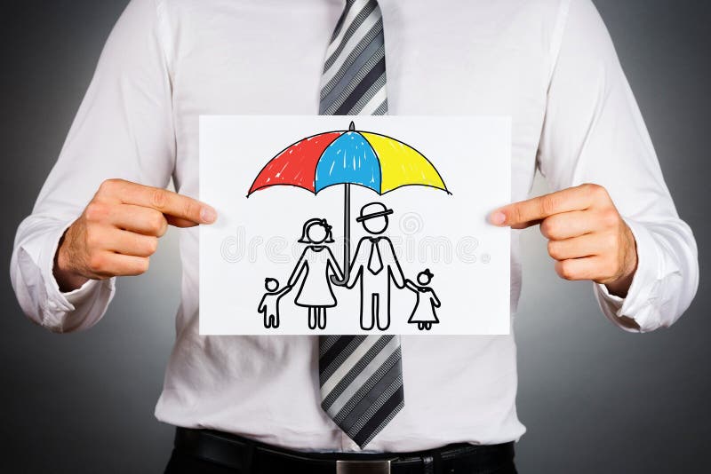 Businessman holding paper with drawing of a family under the umbrella. Businessman holding paper with drawing of a family under the umbrella.