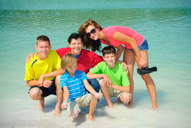 Happy family by the lake stock photo. Image of bond, relative - 3013232