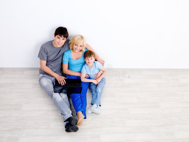 Family with laptop - high angle stock photo