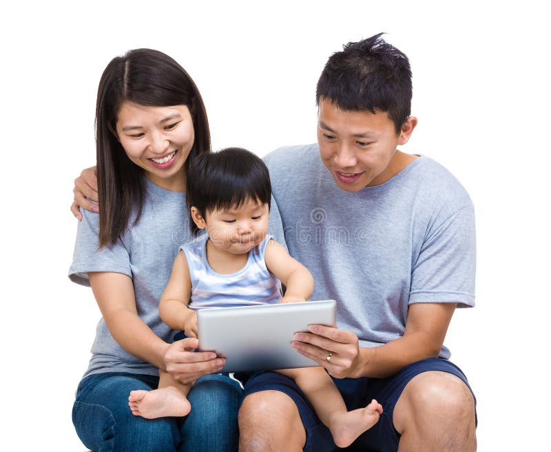 Family look at tablet together