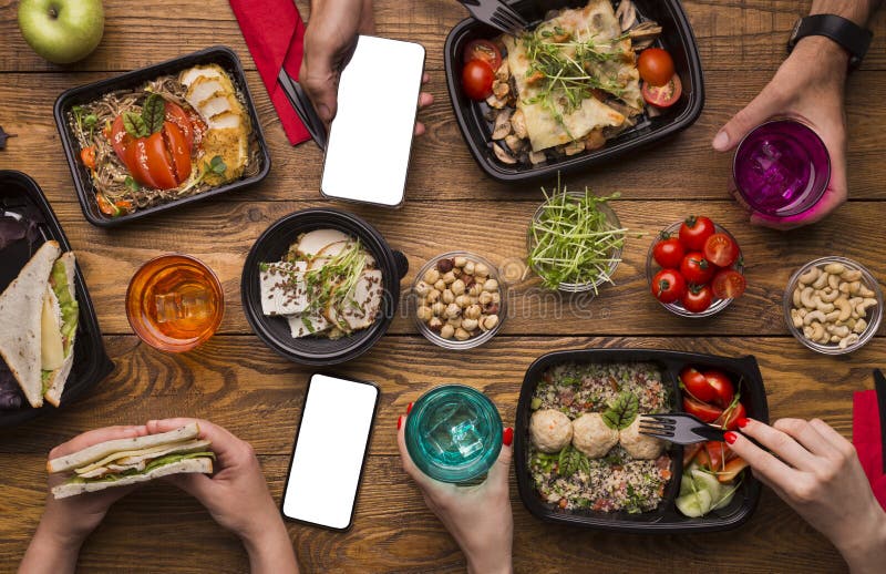Family lunch at home with healthy meal in take away boxes stock photos Family lunch at home with healthy meal in take away boxes stock photos