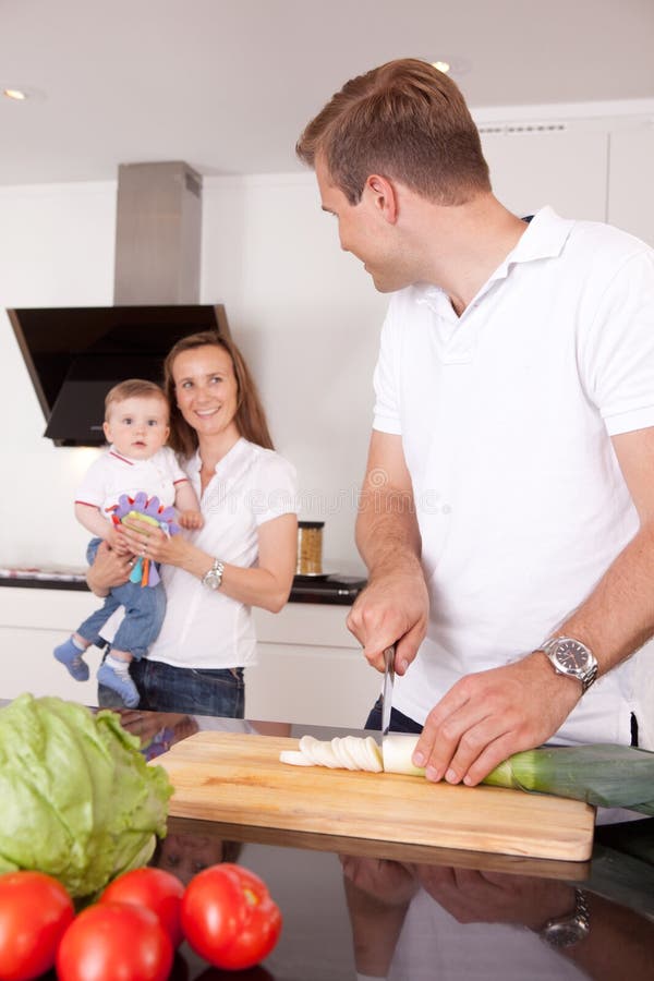 Family Making Meal stock image. Image of family, home - 21081999