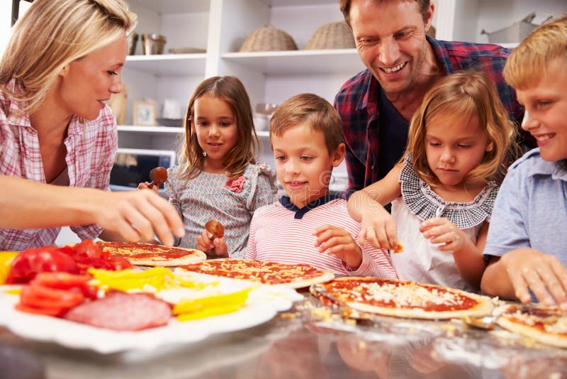 Family Making Pizza for Dinner Stock Image - Image of food, hobbies ...
