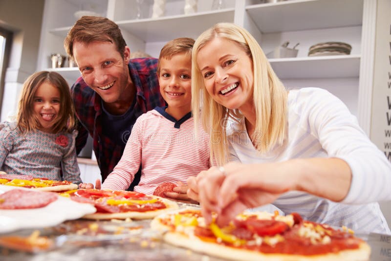 https://thumbs.dreamstime.com/b/family-making-pizza-together-54734457.jpg