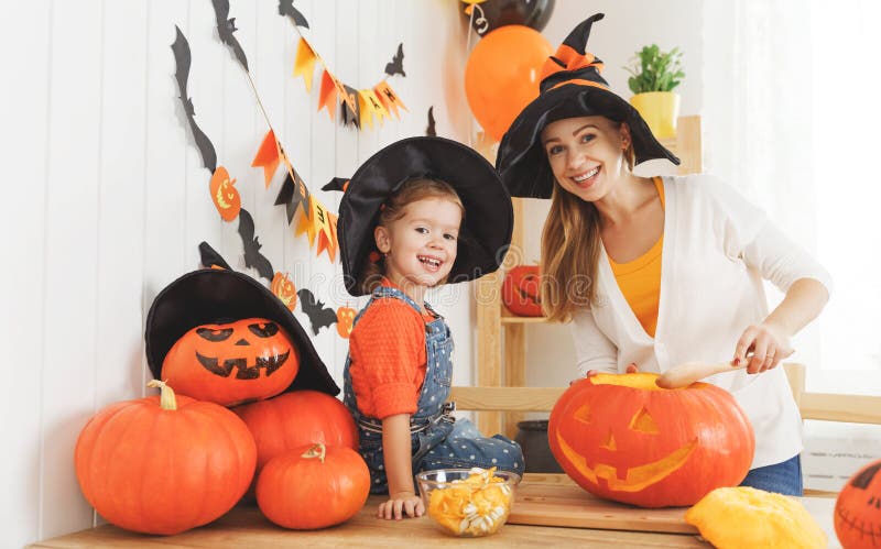 Family Mother and Child Daughter in Hat Witch are Preparing for Stock ...