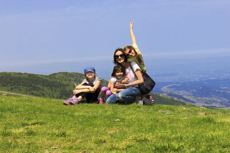 Family on the mountain stock photo. Image of landscape 43149440