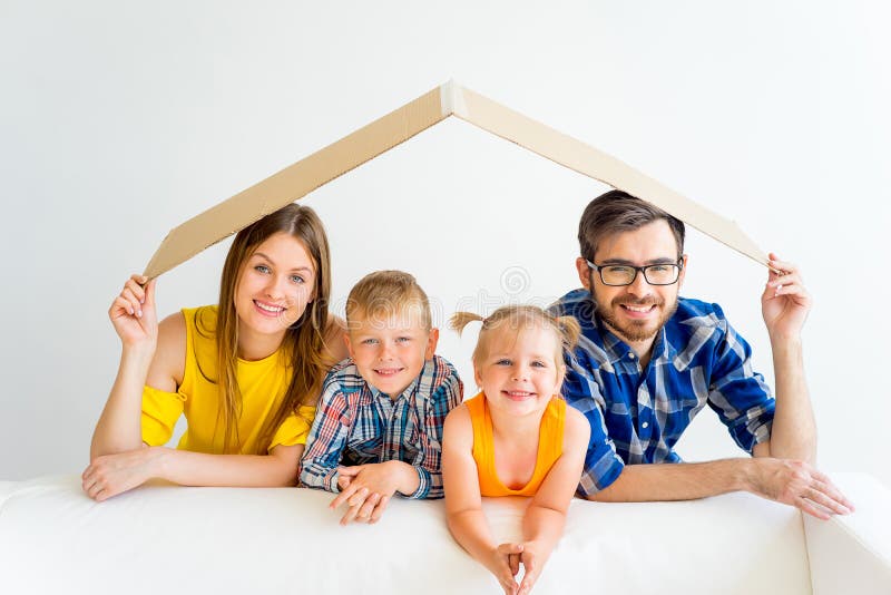 Family moving into new house stock photo Family moving into new house stock photo
