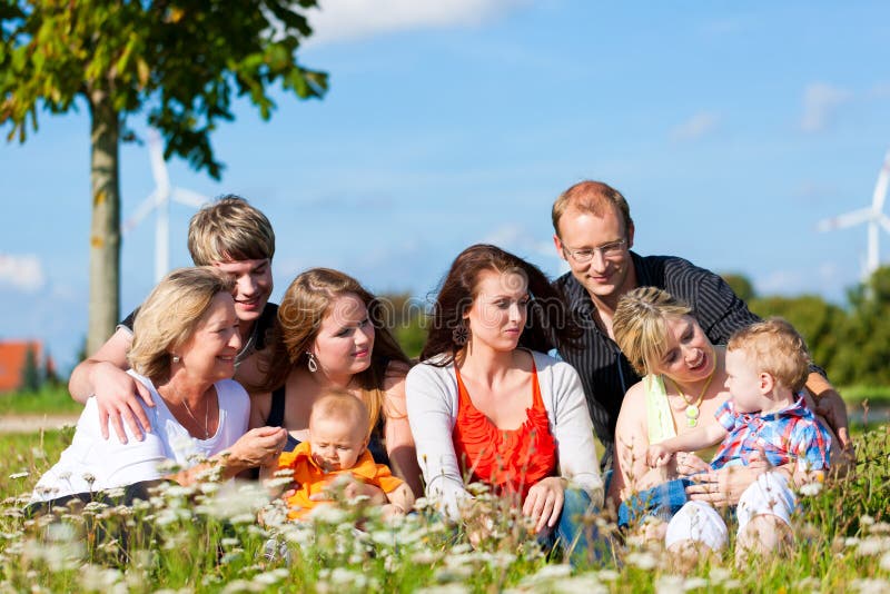 Family and multi-generation - fun on meadow in sum royalty free stock images Family and multi-generation - fun on meadow in sum royalty free stock images