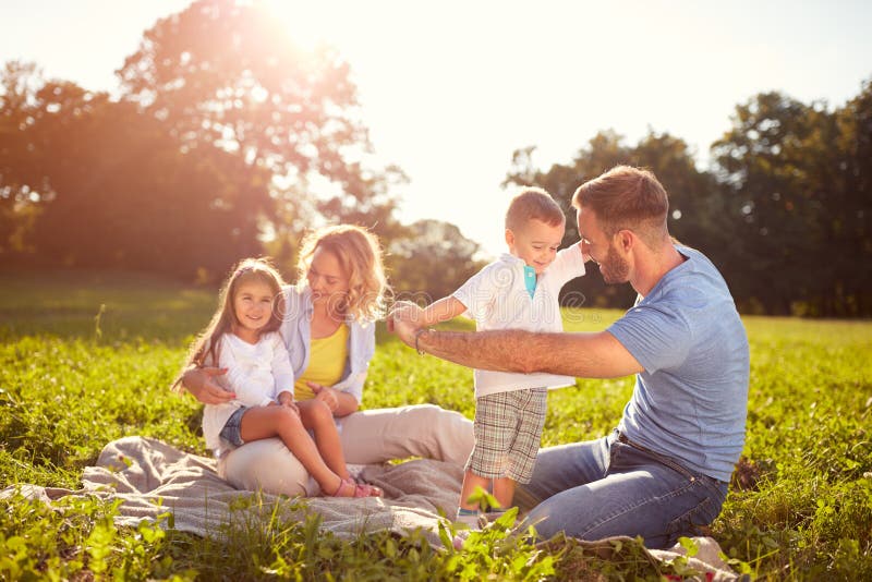 Family with children on picnic in park. Family with children on picnic in park