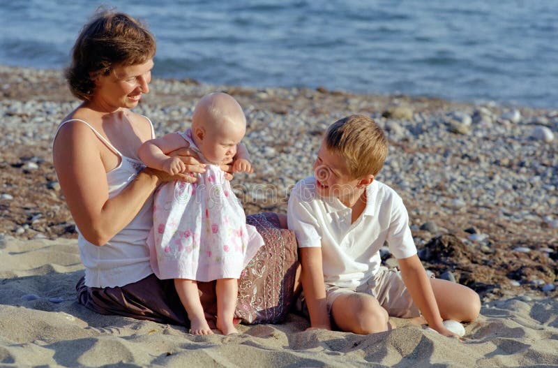 Family play on a beach