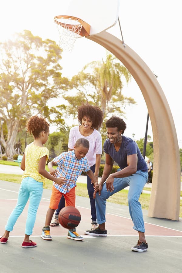 Family Playing Basketball Together royalty free stock images