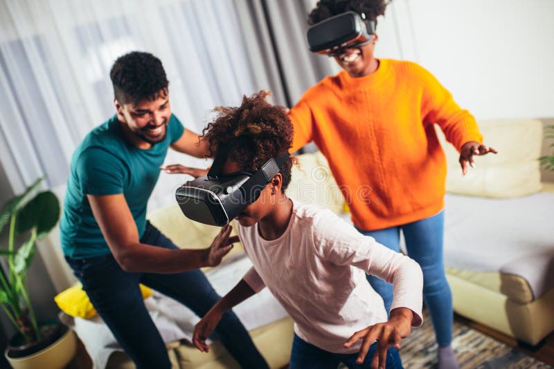 Family Playing Video Games with VR Glasses Stock Photo Image of