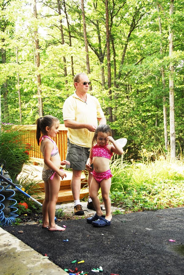 Family Playing Water Balloons