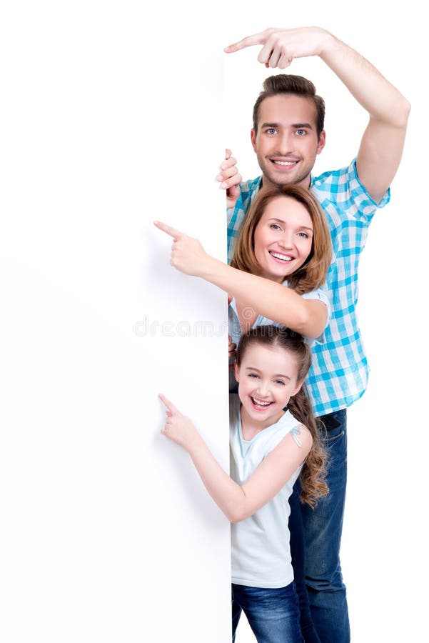 Family pointing by finger to the banner stock image