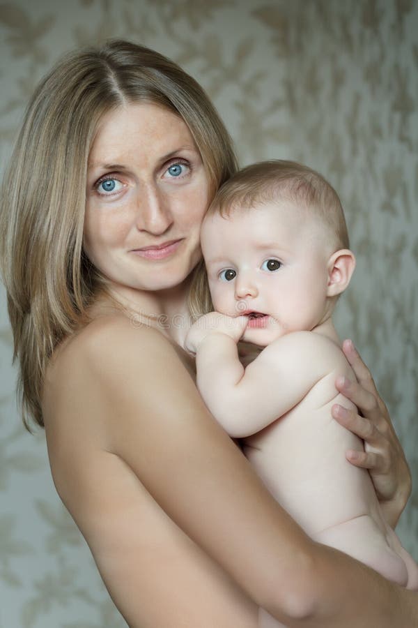 Smiling Mother Holding Baby Stock Image - Image of multi, beautiful