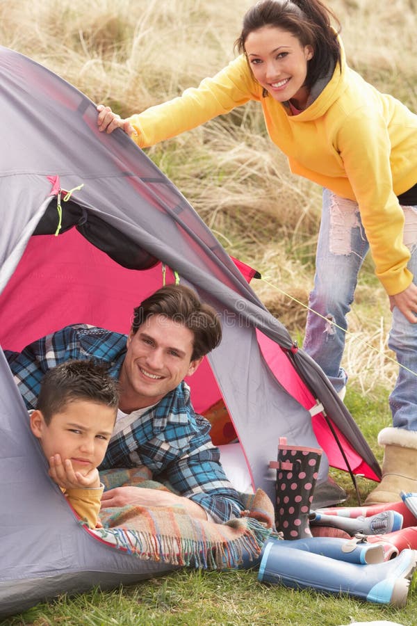 Family camping in tent stock image. Image of activity 6808781
