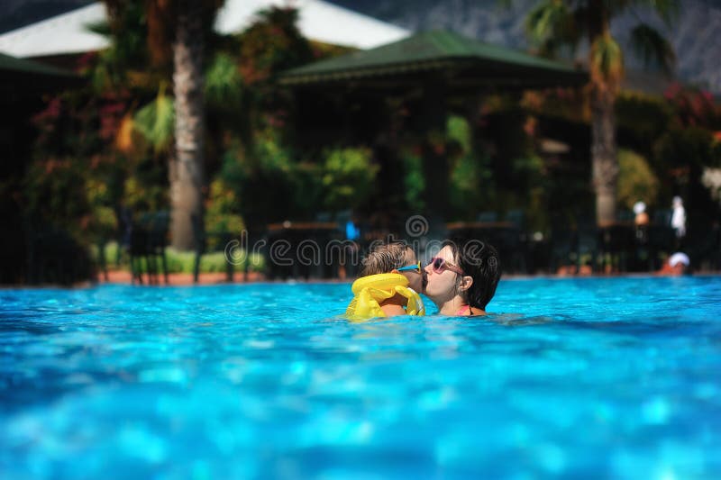 Family rest in pool