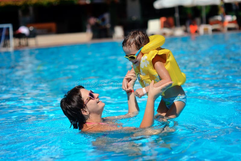 Family rest in pool