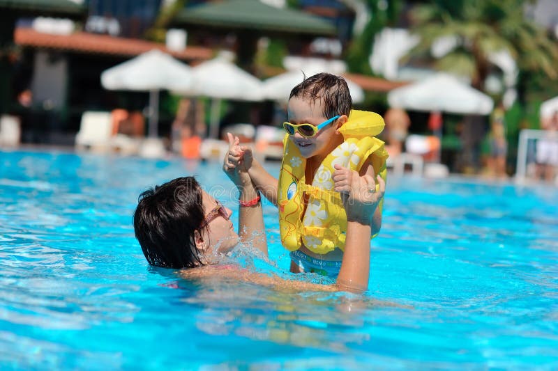 Family rest in pool