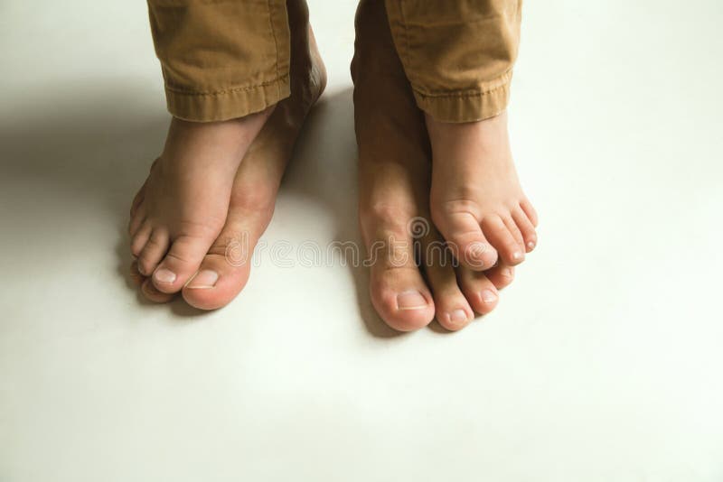 Family`s Legs on White Studio Background, Dad and Son Stock Image ...