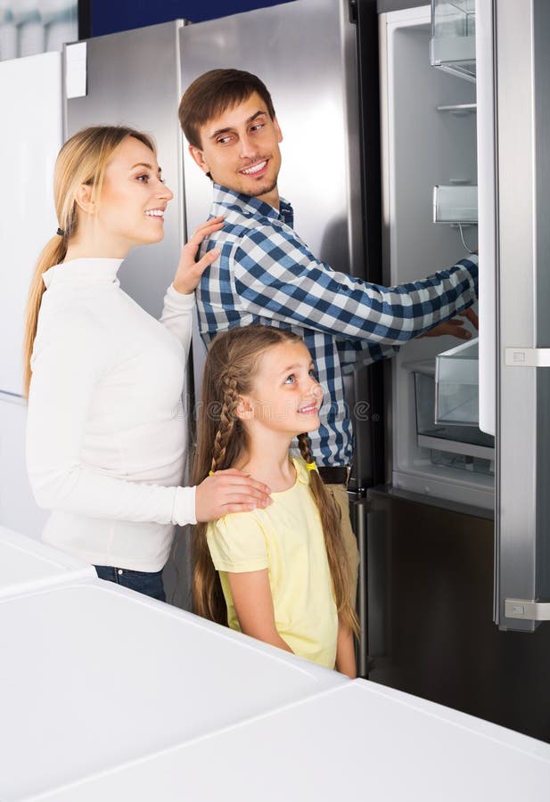 244 Family Selecting Refrigerator Stock Photos Free & RoyaltyFree