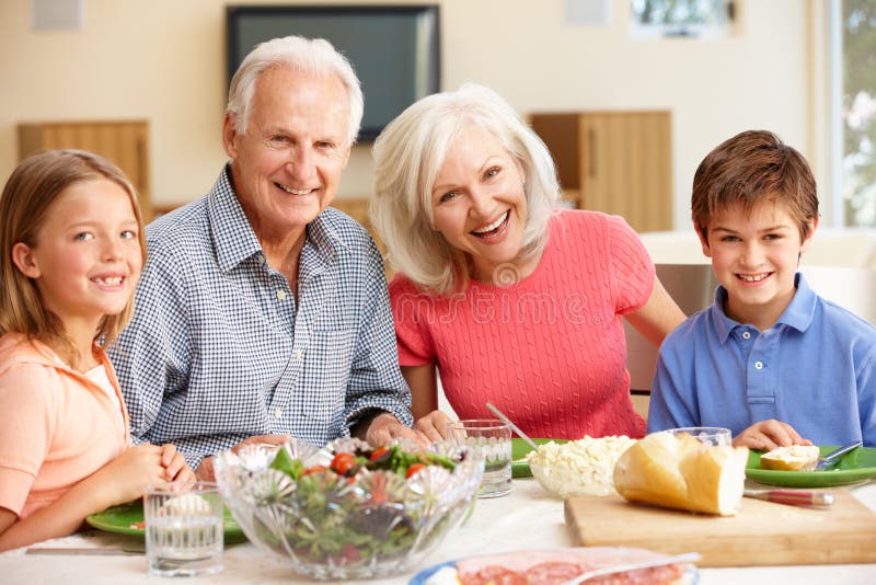 Family sharing meal stock image. Image of food, female 54953125