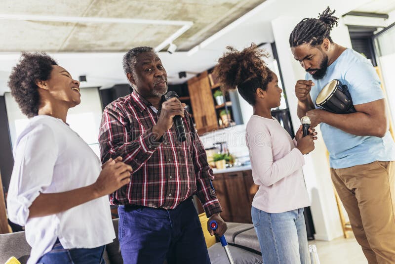 Family Singing Karaoke with Microphones at Home Stock Photo Image of