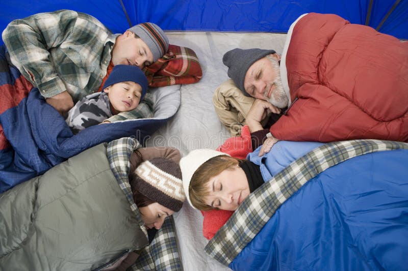 Family Sleeping In Tent royalty free stock images Family Sleeping In Tent royalty free stock images