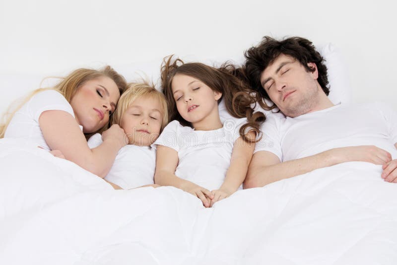 Family sleeping together stock image. Image of lifestyle 87769487